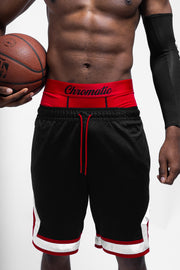 Basketballer wearing black and red Chromatic boxers holding a basketball