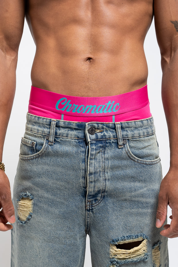 Model wearing south beach chromatic boxer pink and blue