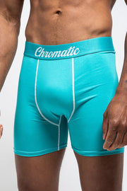 Torquoise boxer briefs with 'Chromatic' waistband on a white background